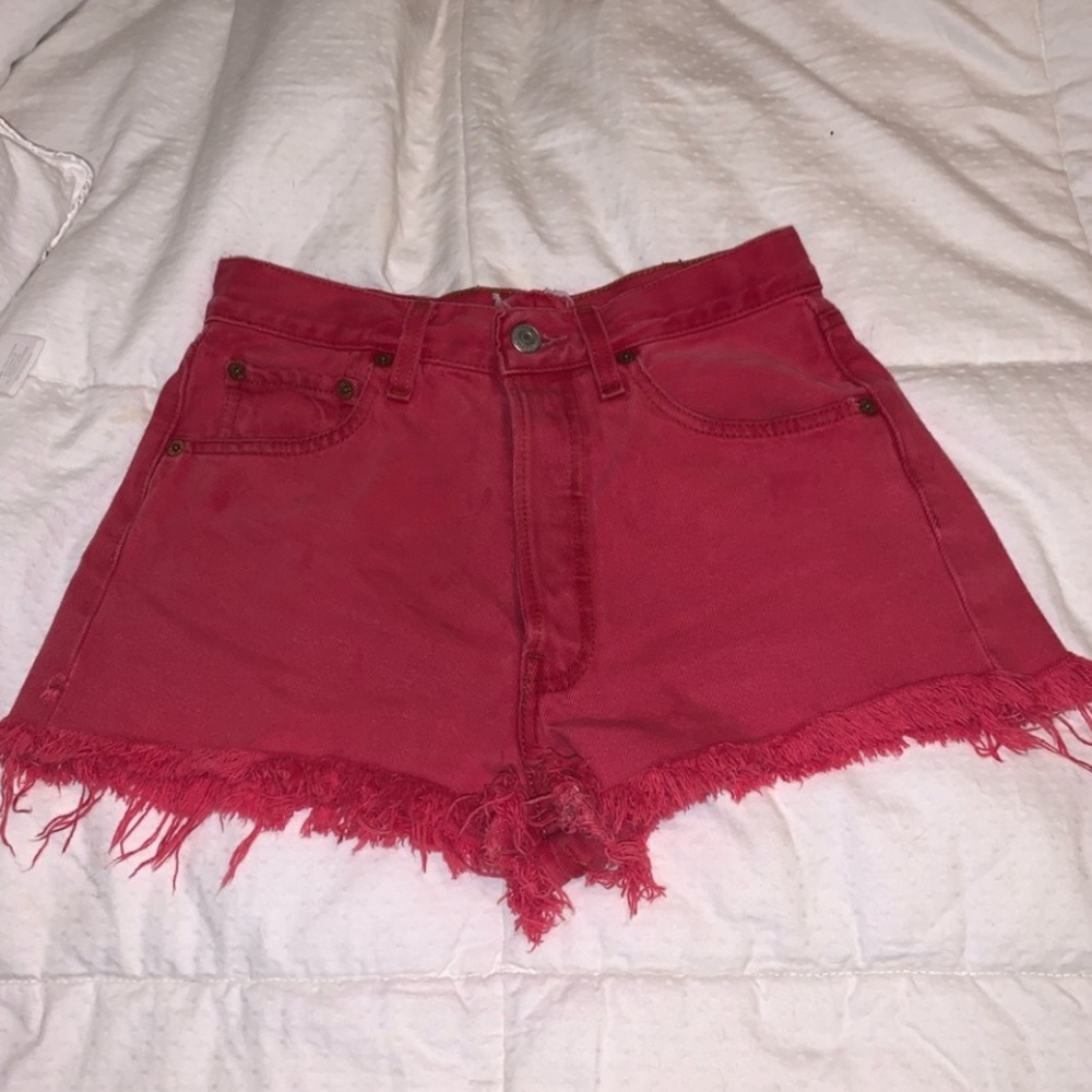 Red Levi’s shorts